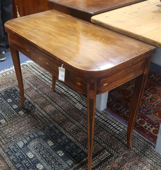 A Regency mahogany and rosewood crossbanded folding top tea table, W.92cm